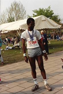 Images Dated 25th July 2016: British Caribbean marathon runner standing with medal