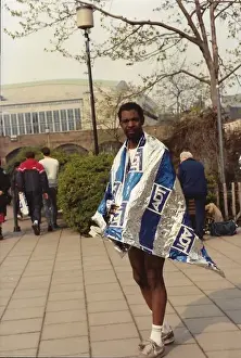 British Caribbean runner standing with ADT sponsored foil wr
