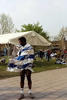 Swept Prints: British Caribbean runner standing with wind swept foil wrap