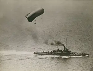 Towing Prints: A British destroyer towing an observation balloon