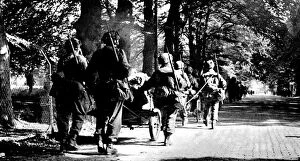 Guns Collection: British First Airborne Troops march towards Arnhem; Second W