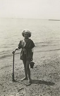 Images Dated 30th April 2020: British girl with a bucket and spade - waters edge