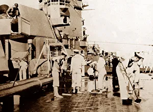 British Navy sailors swabbing the decks