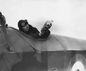 Messenger Prints: British pilot with messenger pigeon, WW1
