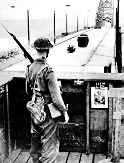 Capture Collection: British Sentry keeping watch on Nijmegen Bridge; Second Worl