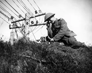 Wires Prints: British soldier checking telephone lines, WW1