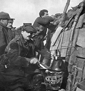Kettle Prints: British soldier cooks dinner on a brazier in trench