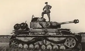 Disused Prints: British soldier standing on top of disused tank