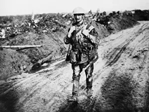 Solitary Prints: British soldier walking along a road, WW1