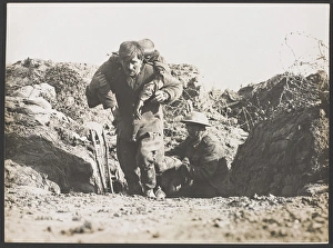Regimental Gallery: British soldiers with casualty - WW1