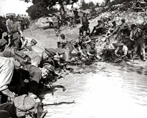 British soldiers cleaning harness in pond, WW1