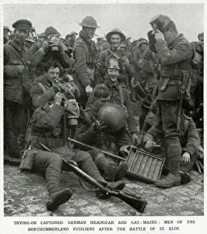 British soldiers trying on captured German headgear 1916