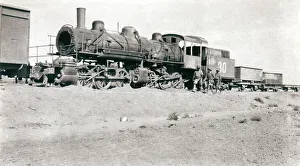 Iraq Gallery: British soldiers walking past a train, Iraq