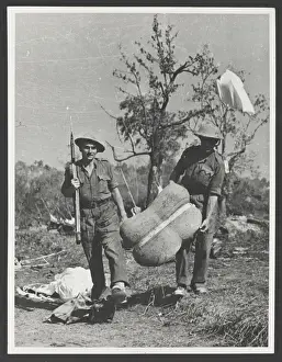 Admin Prints: British troops collecting air-dropped supplies into the Admi