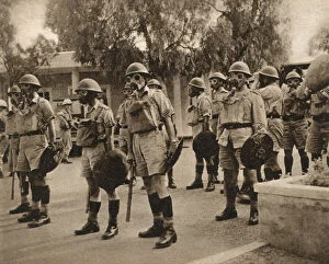 Riots Collection: British troops in gas masks - Uprising in Nicosia