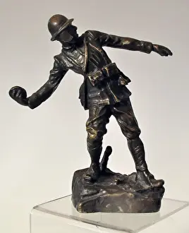 Bronze figure of an Italian bomber wearing Farina helme