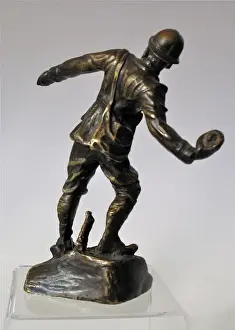Disc Prints: Bronze figure of an Italian bomber wearing Farina helme