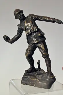Bronze figure of an Italian bomber wearing Farina helme