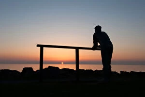 Bonnie Collection: Bronze statue of fisherman watching the sunset, Port William