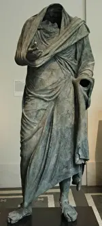 Bronze statue of a man dressed with an himation (2nd-1st cen