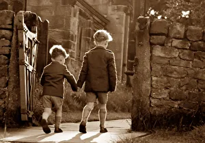 Brothers holding hands in the 1930s