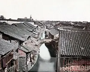 Buildings and water, possibly in Canton (Guangzhou), China