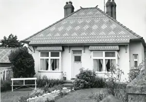 Quarrying Prints: Bungalow with patterned slate roof, North Wales
