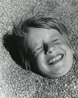 BURIED IN THE SAND