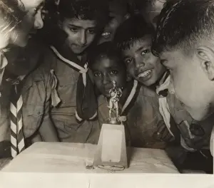 Burmese scouts with statue and badge