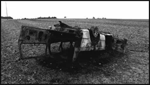Images Dated 16th September 2015: Burnt out car abandoned in a field