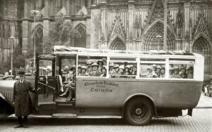Images Dated 20th April 2020: A Bus Tour of Cologne (Koln), Germany - the tour has reached the Cathedral (Dom)