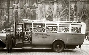 Visitors Prints: A Bus Tour of Cologne (Koln), Germany - the tour has reached the Cathedral (Dom)
