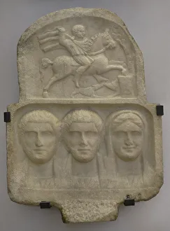 Heros Prints: Busts of two bearded men and a woman. Above: relief