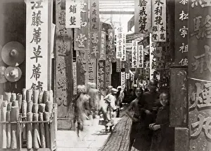 Guangzhou Prints: Busy street Canton (Guangzhou) China, circa 1890s. Date: circa 1890s