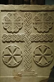 Byzantine relief decorated with crosses. Marble slab. Greece