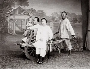 c. 1880s China - women and a baby on a wheelbarrow