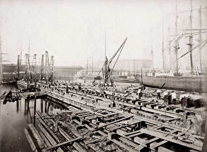 Cranes Collection: c. 1880s - dockyard scene, probably London, with cranes