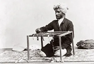 c. 1880s India - man working with cloth