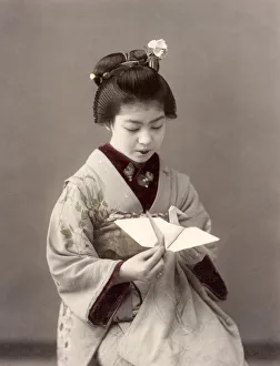 Fold Prints: c. 1880s Japan - geisha with a paper bird