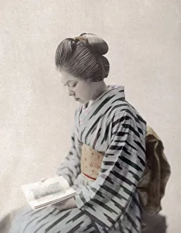 c. 1880s Japan - geisha reading a book