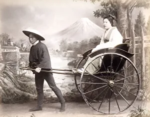 c. 1880s Japan - geisha in a rickshaw