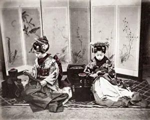 c. 1880s Japan - geishas with sewing clothes