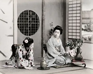 c. 1880s Japan - geishas with tea pot and flowers