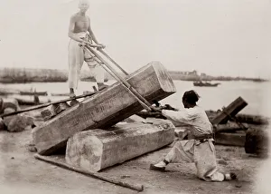 Sawing Prints: c. 1900 China - carpenters sawing a log
