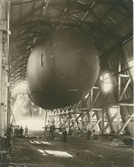 A Cadet standing by a Royal Naval Air Service SS-2