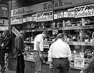 Images Dated 6th January 2012: In Front of Camera Shop