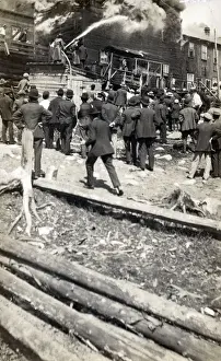 Aflame Prints: Canada - Ontario - Mining Town - Cobalt - Firefighters on shed roof fighting blaze