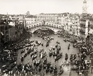Canal crowded gondolas, festival, Rialto Bridge, Venice, Ita
