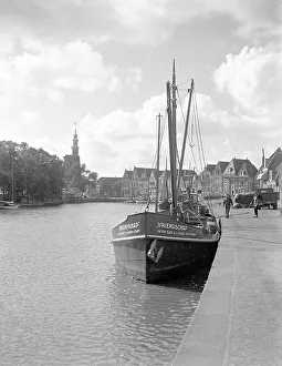 Canals. Boats and streets in Holland