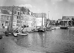 Canals. Boats and streets in Holland
